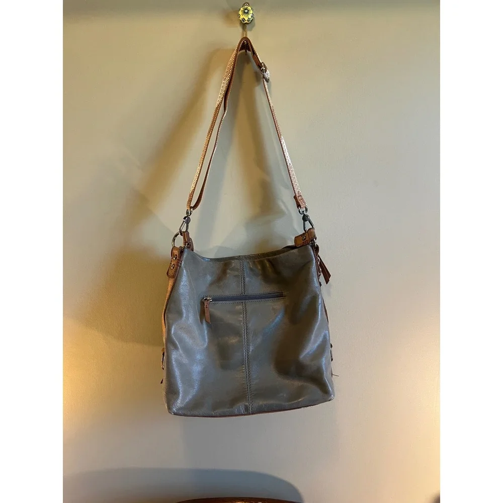 The Sak Slate Gray Leather Hobo Crossbody Bag with Chevron Guitar Strap